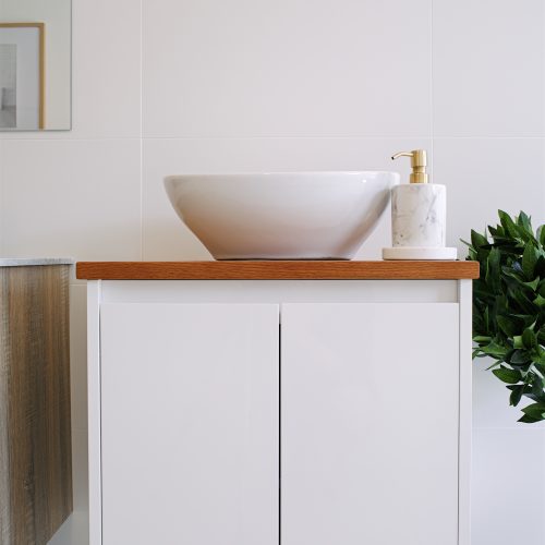 White wall hung vanity with bamboo top
