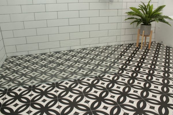 Black and white feature floor tile against subway wall tiles